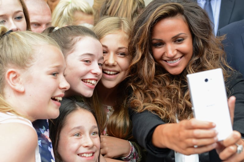Michelle Keegan posed with fans at the opening of BANK, Liverpool ONE, in August, 2014. Image: Richard Martin-Roberts/Getty.