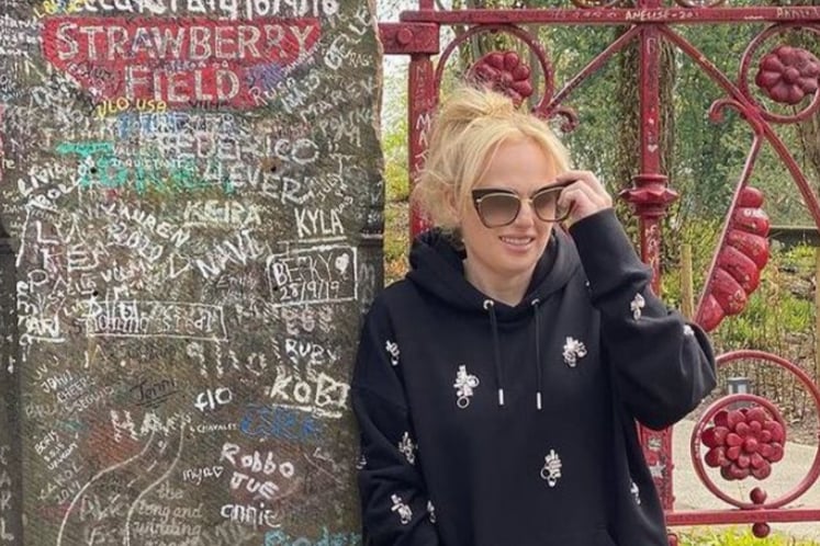 Rebel Wilson enjoyed a sightseeing tour in April 2021 and shared a photo of herself at Strawberry Field. She was also seen on Wirral and other parts of Merseyside. Image: Rebel Wilson via Instagram.