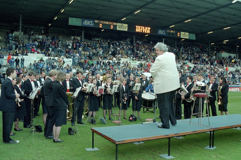 A band plays at the Whites’ final home game of the season, when the Kop stood for the last time before Elland Road became an all-seater stadium in accordance with the findings of the Hillsborough stadium disaster inquiry report.