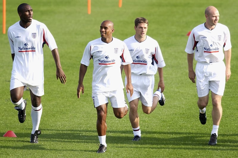 Danny Mills warms up with Sol Campbell, Trevor Sinclair and Michael Owen at an open training session in Jeju, Korea before England’s opener against Sweden.