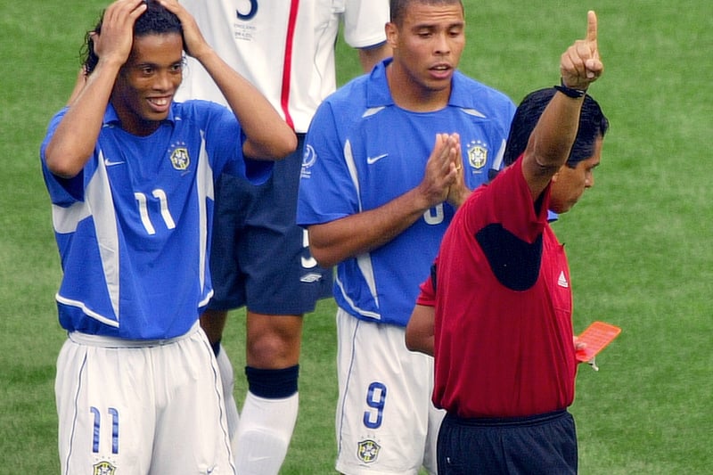 Ronaldinho is shown a red card, giving England half an hour to level the scores against the 10-men Seleção.