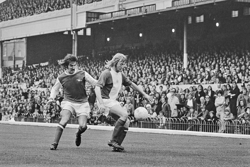 Footballers Brian Chambers (left) of Arsenal and Kenny Burns of Birmingham City during a League Division One match at Highbury Stadium in London, UK, 6th October 1973. The score was 1-0 to Arsenal.  