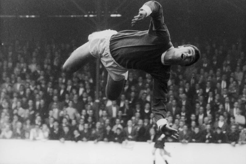 6th October 1962:  Birmingham goalkeeper Colin Withers leaps into action during a match against West Ham. His efforts were unnecessary, as the ball went over the crossbar.  (Photo by Keystone/Getty Images)