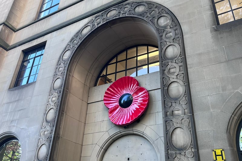 A poppy on the side of Manchester Town Hall by the War Memorial on St. Peter’s Square. Credit: Manchester World