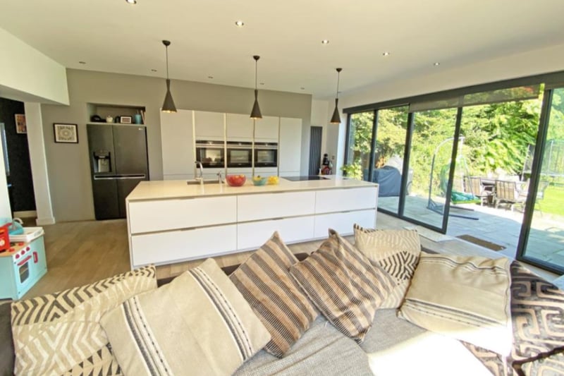 The kitchen also have a family living area, perfect for relaxing whilst dinner cooks.