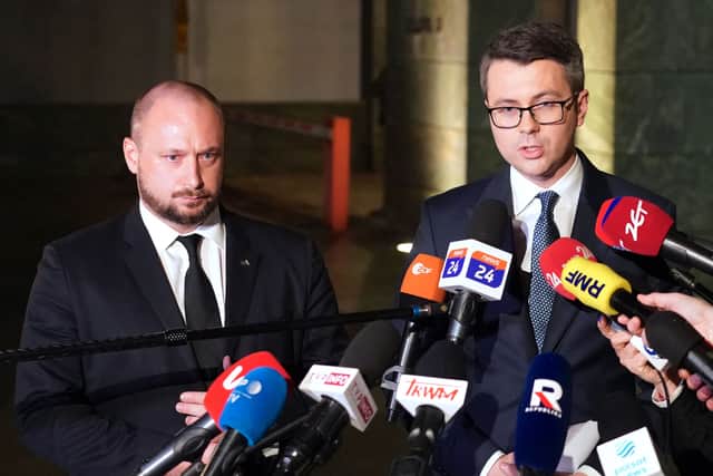 Head of the Office of National Security, Jacek Siewiera (L), and Spokesperson  of the Polish government, Piotr Muller, make a statement after a crisis meeting  of the Office of National Security, in Warsaw, on November 15, 2022