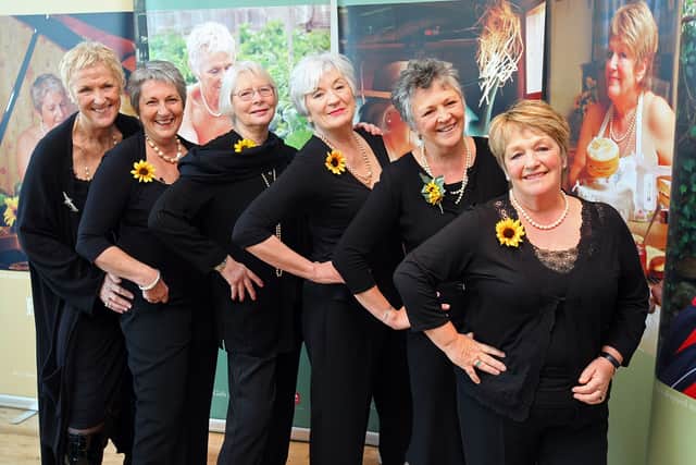 Calendar girls (L-R) Tricia Stewart, Angela Baker, Beryl Bamforth, Lynda Logan, Chris Clancey and Ros Fawcett launch their second nude calendar, 10 years on from the original best seller on May 11, 2009 in Leeds, England. In 1999 Angela Baker and her friends from the Womens Institute bared all for a fundraising calendar after Angela's husband John died from non-Hodgkin's Lymphoma.  The calendar became an international success and the story for a Hollywood movie raising over 2GBP million for charity.  (Photo by Christopher Furlong/Getty Images)