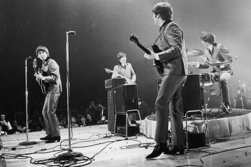The Beatles in performance at the Washington Coliseum. Image: Central Press/Getty