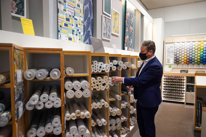 Labour Party leader Sir Keir Starmer browses through the wallpaper section at John Lewis & Partners in April 2021 
Credit: Getty
