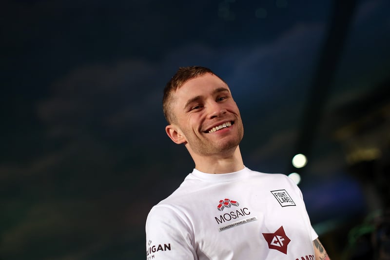 Carl Frampton takes part in a public work in 2016 
Credit: Getty
