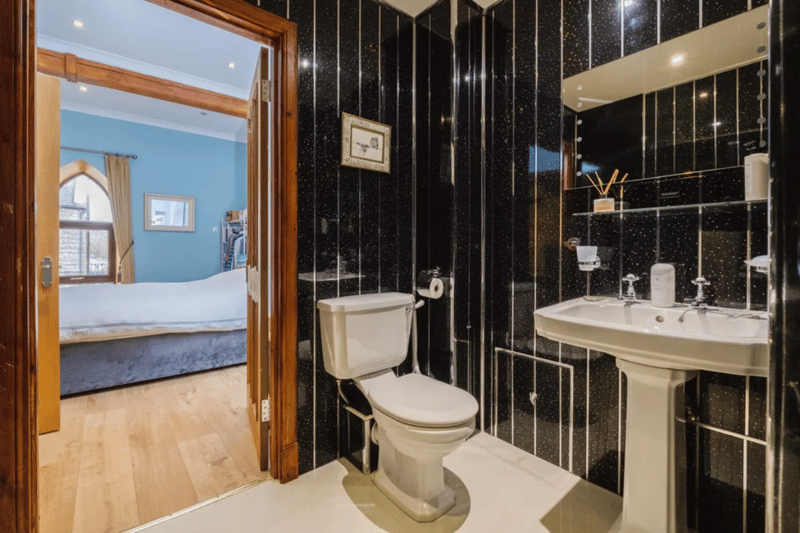 Bathrom en-suite area in the three-bed flat for sale In Lybster, Caithness