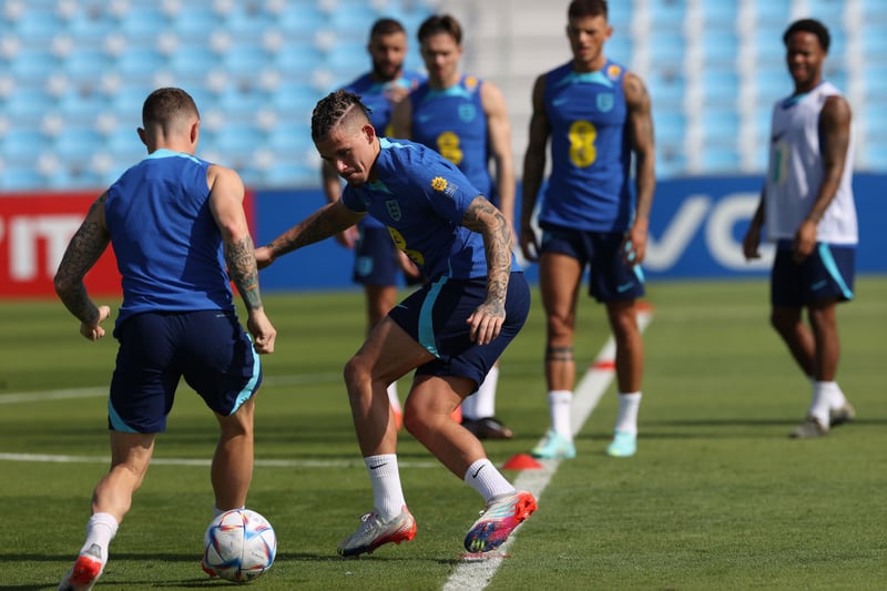 Kalvin Phillips tracks Kieran Trippier (l) during the England Training |session at Al Wakrah Stadium on November 17, 2022 in Doha, Qatar. (Photo by Michael Steele/Getty Images)