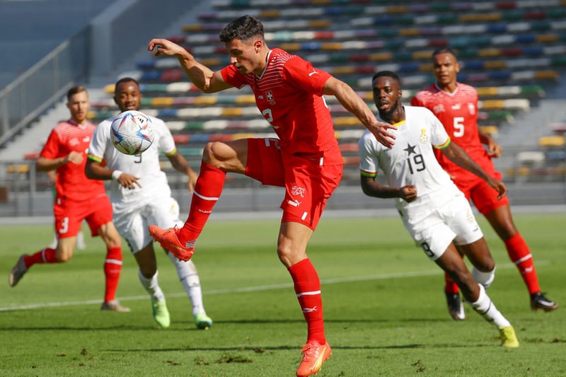 Switzerland's defender Fabian Schar (C) controls the ball during a friendly football match between Ghana and Switzerland in Abu Dhabi on November 17, 2022. (Photo by Ryan LIM / AFP) (Photo by RYAN LIM/AFP via Getty Images)