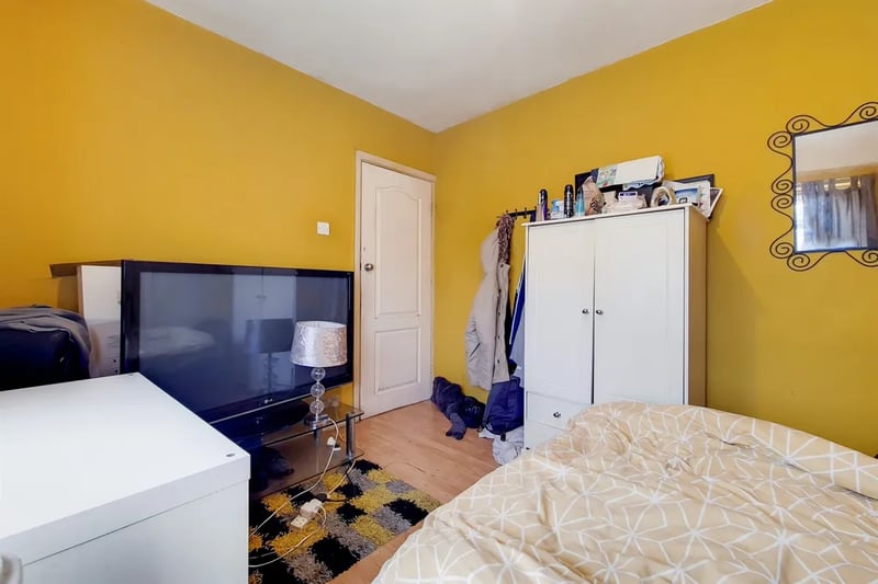 Though who can argue that this color of yellow the other side of the bedroom is off putting for those looking for a new home in London?