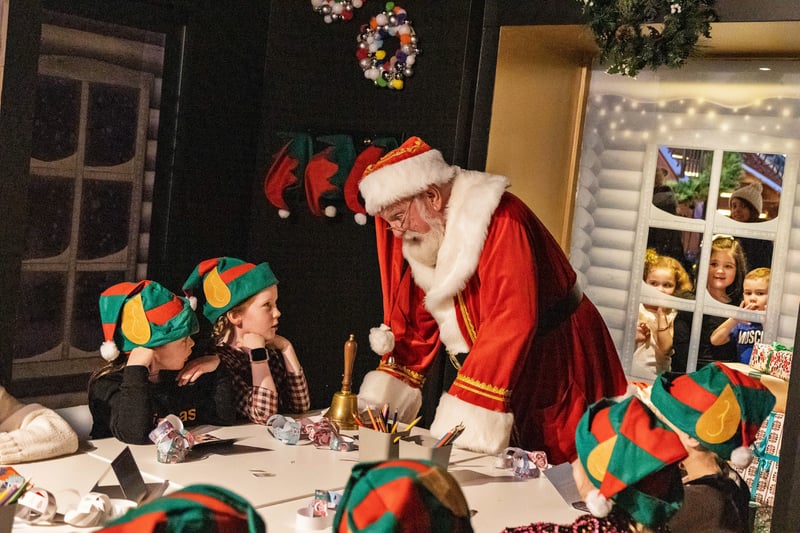 Santa teaches some young aspiring elves at the Princes Square Christmas Lights switch-on