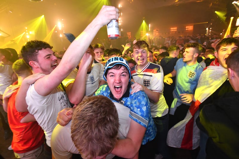 England fans at Mayfield Depot fan zone celebrate the first goal Credit: Getty