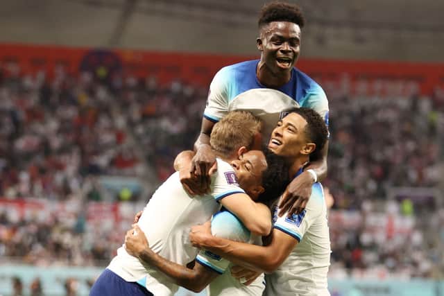 Raheem Sterling of England celebrates with teammates after scoring their team’s third goal (Getty Images)