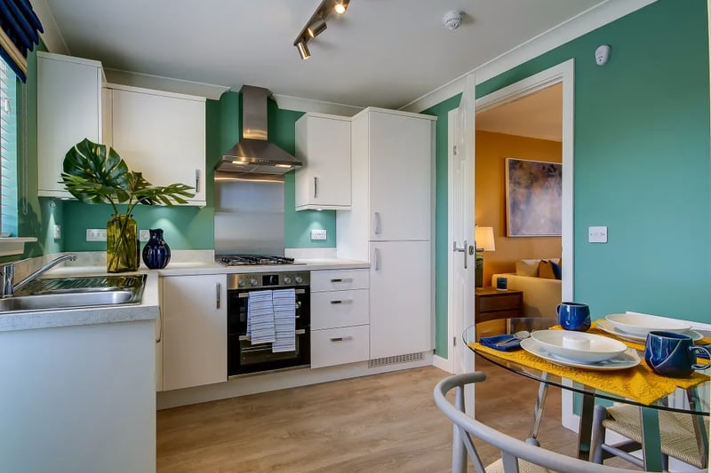 Away from the living room and into the kitchen which is well-equipped and offers access to  a private rear garden