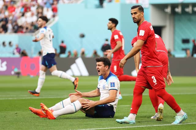 Harry Maguire of England reacts during the FIFA World Cup Qatar 2022 Group B match between England and IR Iran at Khalifa International Stadium (Getty Images)