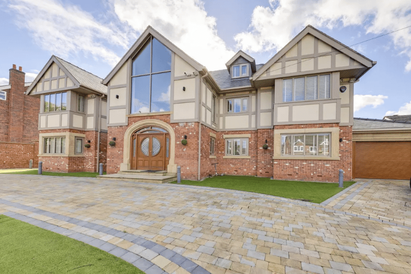 The front of the 5-bedroom mansion on the property market in Woodhouses, Manchester.