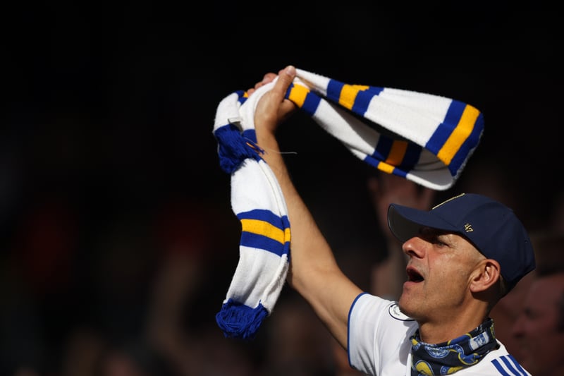 A Leeds United fans waves a scarf during the Premier League match between Leeds United and Wolverhampton Wanderers at Elland Road on August 6, 2022.