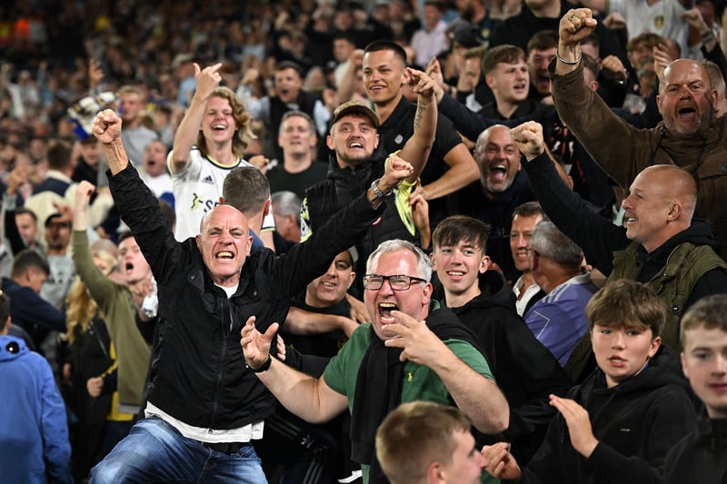 Leeds fans celebrate their goal during the English Premier League football match between Leeds United and Everton at Elland Road in Leeds, northern England on August 30, 2022. 