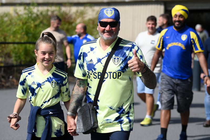 Fans of Leeds United react as they arrive prior to kick off of the Premier League match between Leeds United and Chelsea FC at Elland Road on August 21, 2022. 