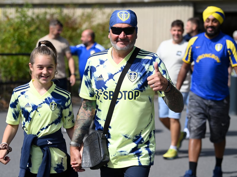 Fans of Leeds United react as they arrive prior to kick off of the Premier League match between Leeds United and Chelsea FC at Elland Road on August 21, 2022. 