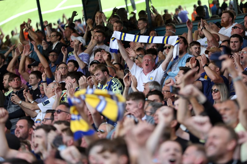 Fans of Leeds United celebrate after their sides victory of the Premier League match between Leeds United and Chelsea FC at Elland Road on August 21, 2022. 