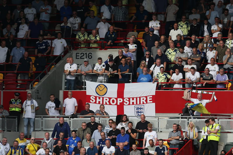 Leeds United supporters watch the action during the Premier League match between Brentford FC and Leeds United at Brentford Community Stadium on September 03, 2022. 