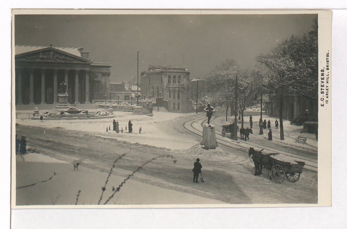 A horse and cart clears the snow outside the Victoria Rooms on the Queen’s Road / Whiteladies Road junction. 