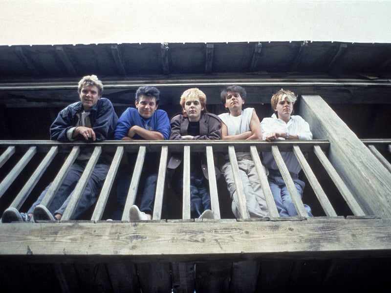 Duran Duran looking down from a balcony, c. 1983 (Photo by Hulton Archive/Getty Images)