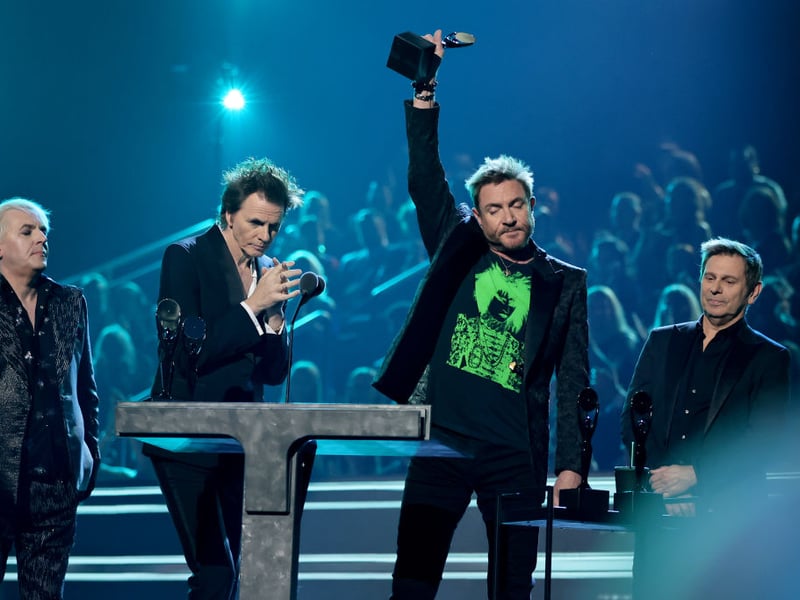  Inductees Nick Rhodes, John Taylor, Roger Taylor and Simon Le Bon of Duran Duran speak onstage during the 37th Annual Rock & Roll Hall of Fame Induction Ceremony at Microsoft Theater on November 05, 2022 in Los Angeles, California. (Photo by Theo Wargo/Getty Images for The Rock and Roll Hall of Fame)