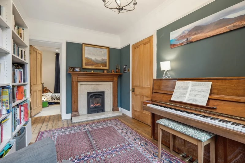 The sitting room features a fireplace perfect for winter nights 