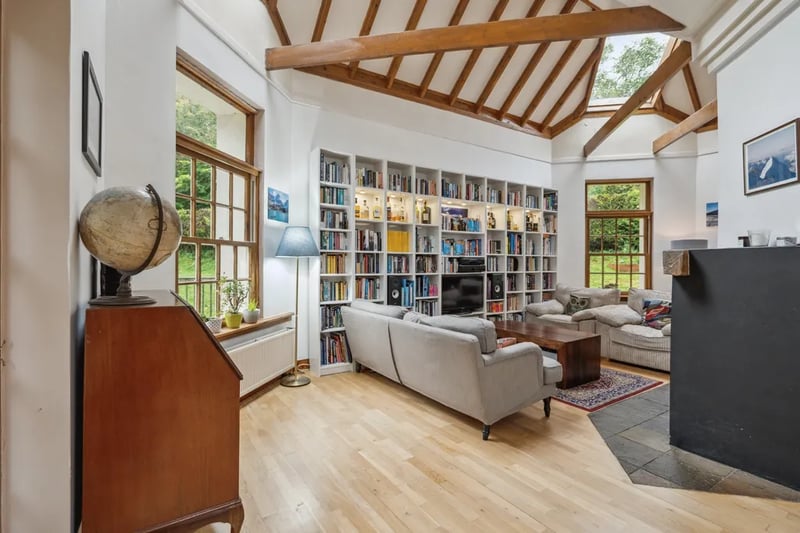 The open plan living space is boosted by the octagonal design and wooden beams  