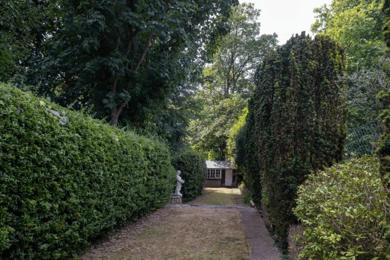 A private pathway leading to the back garden