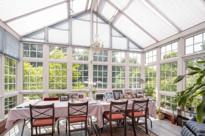 A conservatory that can be used as a dining space for many