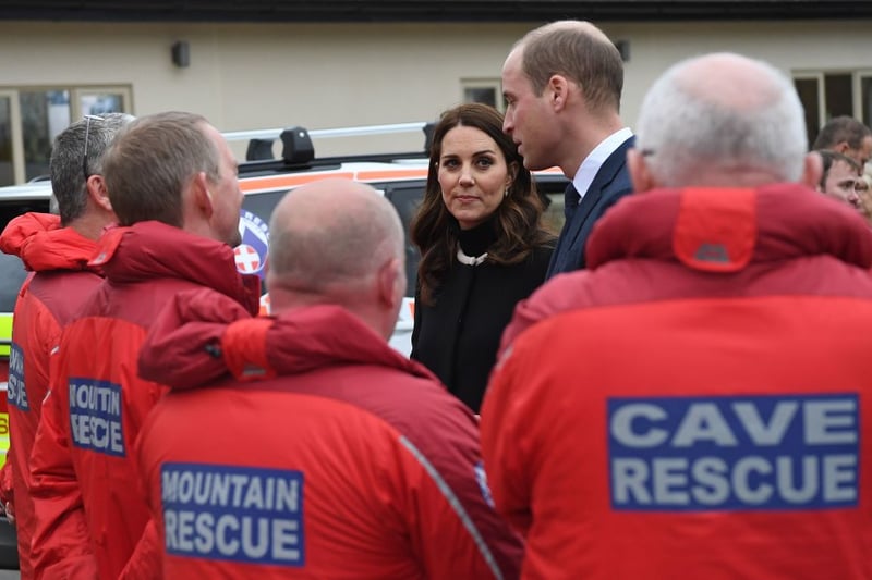 Prince William and Princess Catherine meet member of the Mountain and Cave Rescue services during their visit to Jaguar Land Rover’s Solihull manufacturing plant in Birmingham, central England on November 22, 2017. (Photo credit - PAUL ELLIS/AFP via Getty Images)
