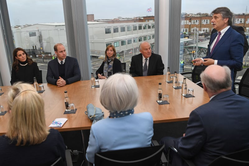 Then-CEO of Jaguar Land Rover Ralf Speth (R) speaks as Prince William and Princess Catherine take part in a round table discussion during their visit to Jaguar Land Rover’s Solihull manufacturing plant on November 22, 2017 in Birmingham, England. (Photo by Paul Ellis - WPA Pool /Getty Images)