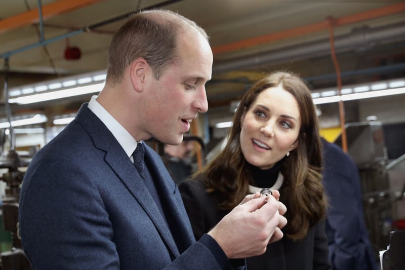 Prince William and Catherine, Prince William and Catherine, Prince and Princess of Wales, inspect a whistle during their visit to Acme Whistles, the creator of the first police whistleand the original Acme Thunderer, in Birmingham on November 22, 2017.      (Photo credit -CHRIS JACKSON/AFP via Getty Images)