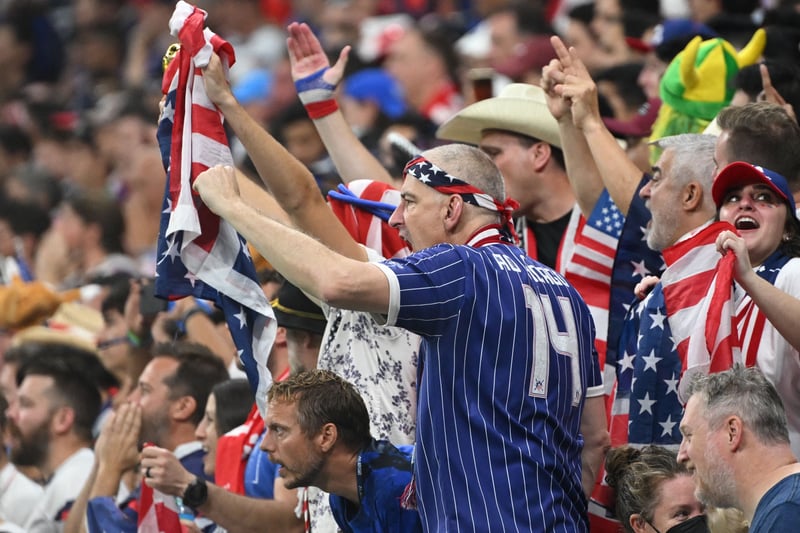 USA supporters cheer v England.