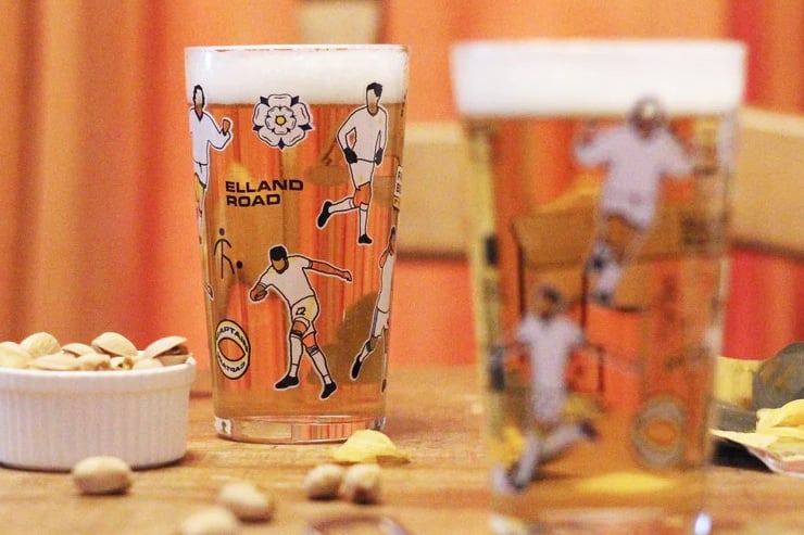 Watching the match from your sofa? Get closer to Elland Road with this striking Whites pint glass. Available to buy at https://bootandballprints.com/collections/pint-glasses/products/leeds-pint-glass.