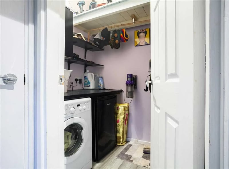 The lower level is boosted by a practical utility room 