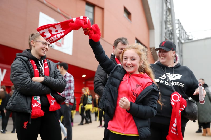 A young Liverpool fan shows their support outside Anfield before the Merseyside derby on September 25, 2022.