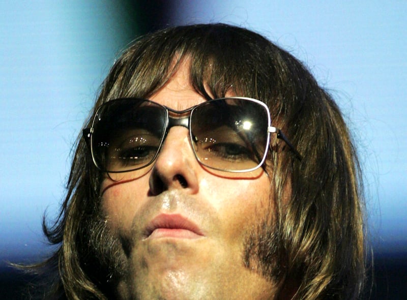  Liam Gallagher performs on stage at The BRIT Awards 2007. Credit: Getty Images