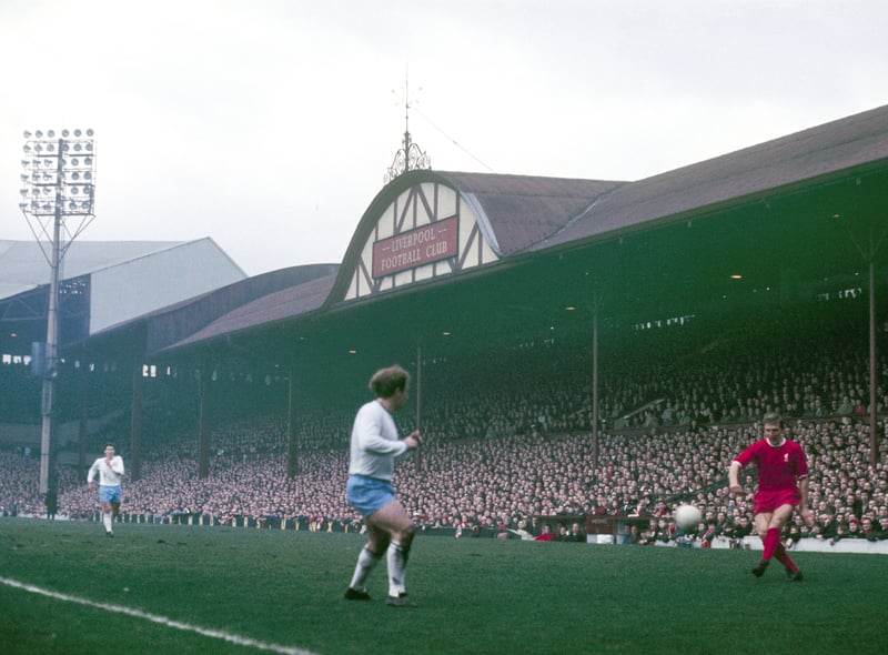 The old the Main Stand in colour as Peter Thompson of Liverpool crosses the ball. (Photo by Liverpool FC via Getty Images)