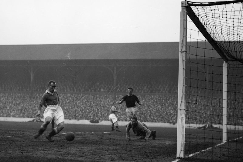 Anfield looked rtaher different when Scottish centre forward Hughie Gallacher scored in front of a packed crowd back in 1932. (Photo by Central Press/Getty Images) 