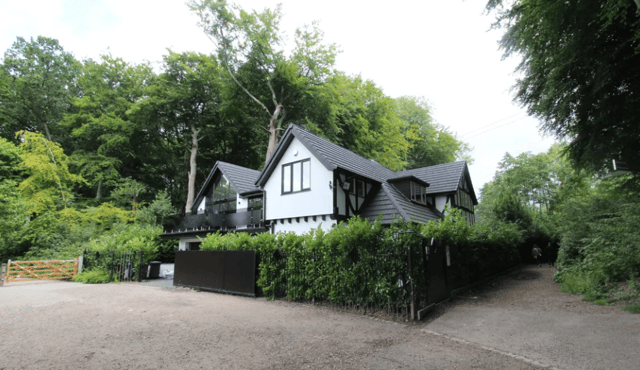 The exterior of the stunning woodland property in Worsley Woods, Manchester