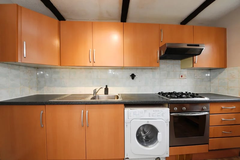 The kitchen has been furnished with ample counter-top space for a microwave or air fryer, and fitted gas hob/oven with extractor fan to keep smells out the reception room