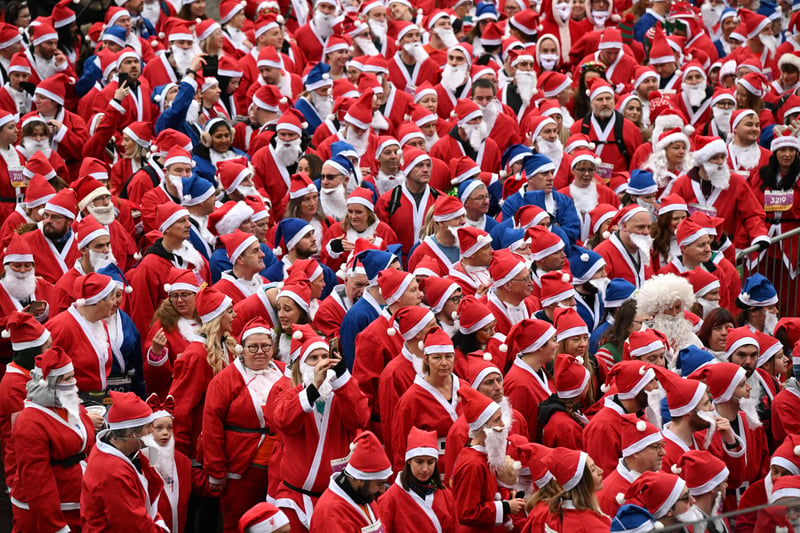 Everton supporters opt to wear a blue suit rather than a red one. (AFP via Getty Images)